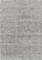 Close-up of the Molena Area Rug. Hand-knotted wool rug in denim, ink blue, light olive, and light sage. Contemporary style. Design-Rectangle-69