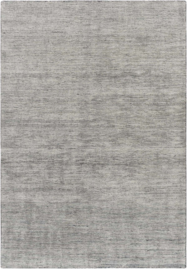 Close-up of the Molena Area Rug. Hand-knotted wool rug in denim, ink blue, light olive, and light sage. Contemporary style. Design-Rectangle-69
