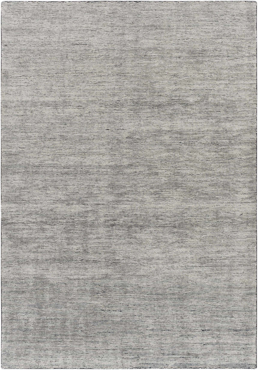 Close-up of the Molena Area Rug. Hand-knotted wool rug in denim, ink blue, light olive, and light sage. Contemporary style. Design-Rectangle-69