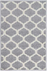 Close-up of the Mongo Carpet in cream and slate. Features a contemporary quatrefoil pattern and machine-woven texture. Design-Rectangle-23