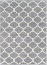 Close-up of the Mongo Carpet in cream and slate, featuring a modern quatrefoil pattern. Design-Rectangle-5373