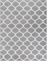Close-up of the Mongo Carpet, a clearance rug with a cream geometric pattern on a slate gray background. Design-Rectangle-710103