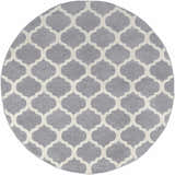 Close-up of round Mongo Carpet. Slate gray rug with a cream quatrefoil pattern. Contemporary style. Design-Round-710