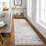Living room scene with a gray sofa and the charcoal and gray Monkland Area Rug runner. Roomscene-Runner