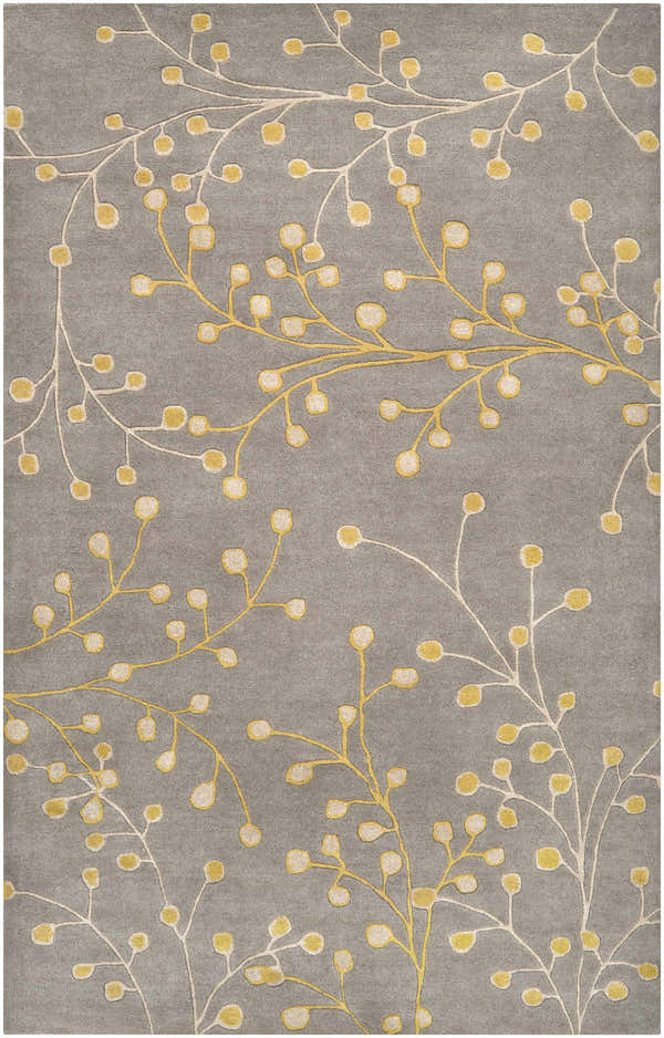 Close-up of the Elsu Mustard Wool Area Rug featuring a floral pattern in mustard and taupe on a charcoal background. Design-Rectangle-58
