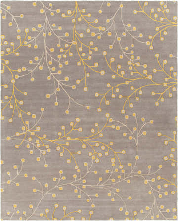Close-up of Elsu Mustard Wool Area Rug featuring a floral pattern in mustard and taupe on a charcoal background. Design-Rectangle-7696