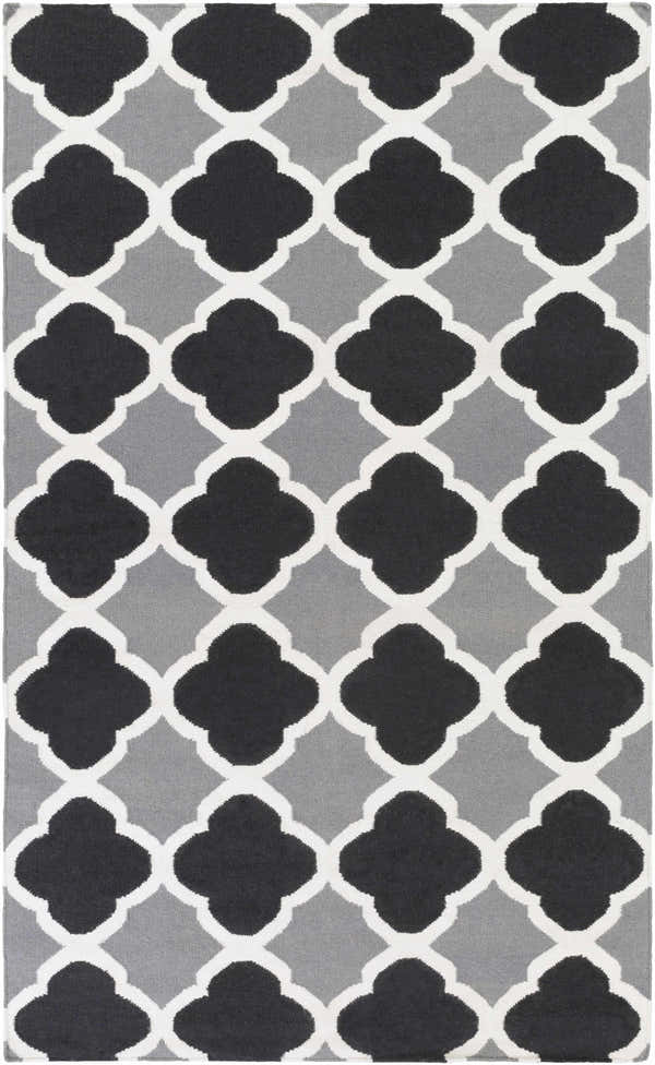 Close-up of the Moorpark Area Rug. Hand-woven wool rug with a black, gray, and ivory quatrefoil pattern. Design-Rectangle-58