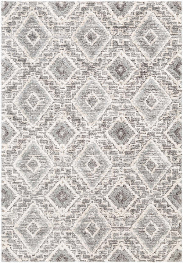 Close-up of the Moruya Area Rug. Beige, charcoal, and cream diamond pattern. Farmhouse style rug. Design-Rectangle-5373