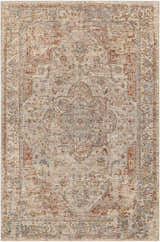 Detailed view of the Marieville Luxe Performance Rug, featuring a traditional oriental pattern in cream, brick red, and blue. Design-Rectangle-6796