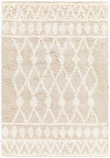 Close-up of the Maso Shag Area Rug. Features a geometric diamond pattern in shades of light peach, nutmeg, and gray. Soft, shag texture. Design-Rectangle-5373