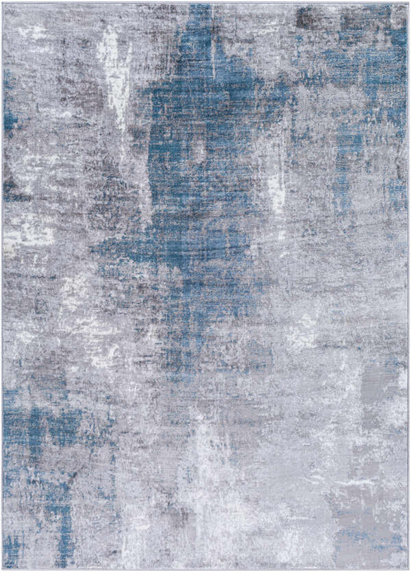 Close-up of the Muff Area Rug with a contemporary abstract design in cream, dark gray, denim, and silver. Design-Rectangle-5373