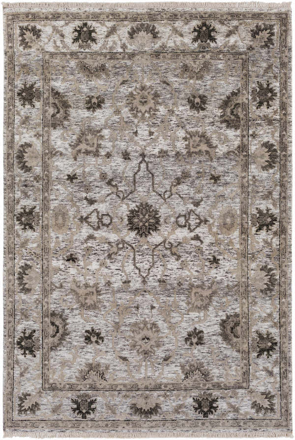 Close-up of the Murchison Area Carpet. Hand-knotted rug with black, cream, and olive floral design. Farmhouse style. Design-Rectangle