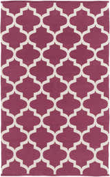 Close-up of Muskogee Magenta Lattice Rug. Hand woven cotton rug with bright pink and ivory quatrefoil pattern. Design-Rectangle-58