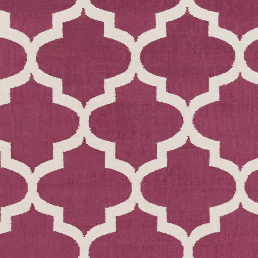 Close-up of the Muskogee magenta rug, featuring a bold lattice pattern in bright pink and ivory. Hand woven cotton texture. Swatch