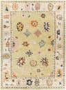 Close-up of the hand-knotted Naas Premium Rug. Features a light sage field with brick, cream, and blue floral accents. Design-Rectangle-912