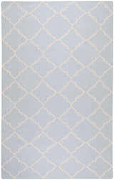 Close-up of the Nadeau Area Rug. Pale blue wool rug with a tan quatrefoil pattern. Hand woven. Design-Rectangle-58