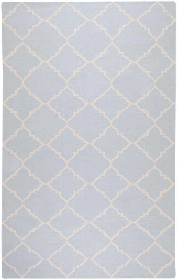 Close-up of the Nadeau Area Rug. Pale blue wool rug with a tan quatrefoil pattern. Hand woven. Design-Rectangle-58