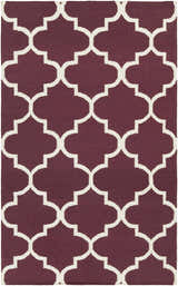 Close-up of Nassau Area Rug. Dark purple wool rug with an ivory quatrefoil pattern, hand woven. Design-Rectangle-58