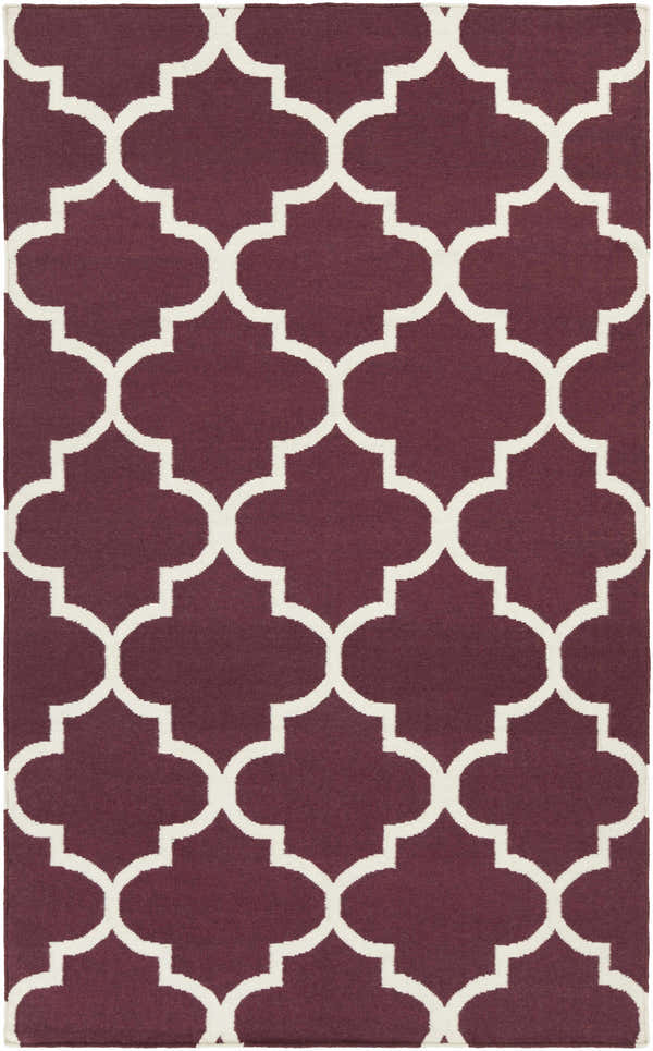 Close-up of Nassau Area Rug. Dark purple wool rug with an ivory quatrefoil pattern, hand woven. Design-Rectangle-58