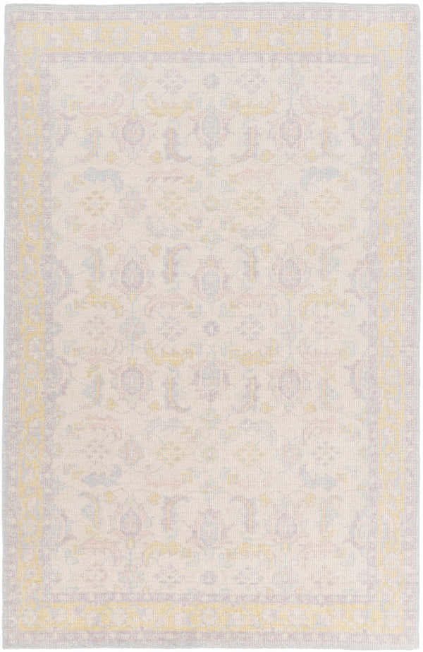 Close-up of the hand-knotted Navarino Area Rug. Traditional design in light beige, dusty pink, and mustard tones. Design-Rectangle-5686
