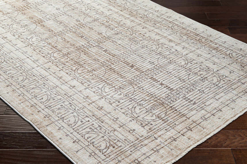 Close-up of the Neena Area Rug showing its dark red, gray, and white contemporary design and machine-woven texture. Corner