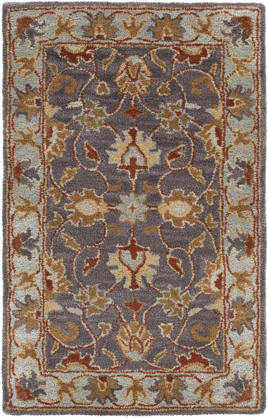 Close-up of the hand-tufted Cherryfield 1004 area rug. Features a traditional floral pattern in beige, burnt orange, and slate blue. Design-Rectangle-23