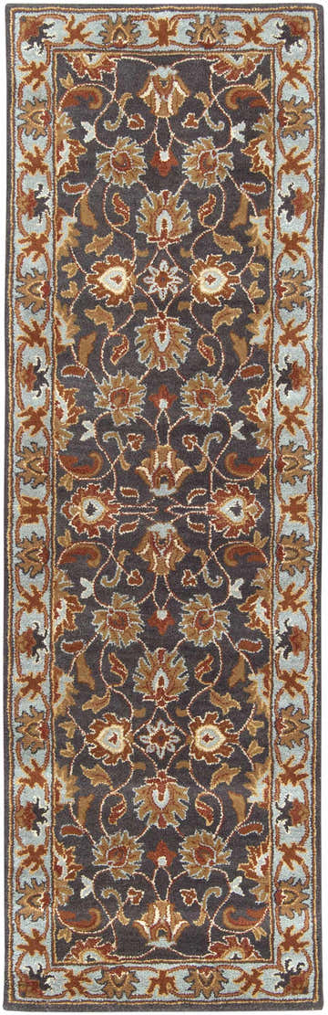 Close-up of the hand-tufted Cherryfield 1004 wool rug. Features a traditional floral pattern in beige, burnt orange, and slate blue. Design-Runner-268