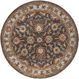Close-up of round Cherryfield 1004 rug. Hand-tufted wool rug in beige, burnt orange, charcoal, and ice blue floral pattern. Design-Round-6