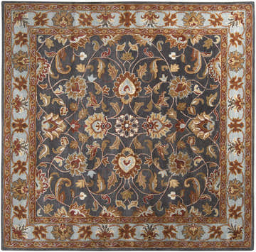 Detailed floral pattern on the Cherryfield 1004 hand-tufted wool area rug. Beige, burnt orange, and slate blue hues. Design-Square-8