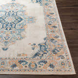 Close up of the Neepawa Area Carpet showing its traditional, oriental design with aqua, cream, and dark blue colors. Front