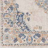 Close-up of Neepawa Area Carpet showing a traditional design in cream, blue, and orange tones. Machine woven texture detail. Swatch