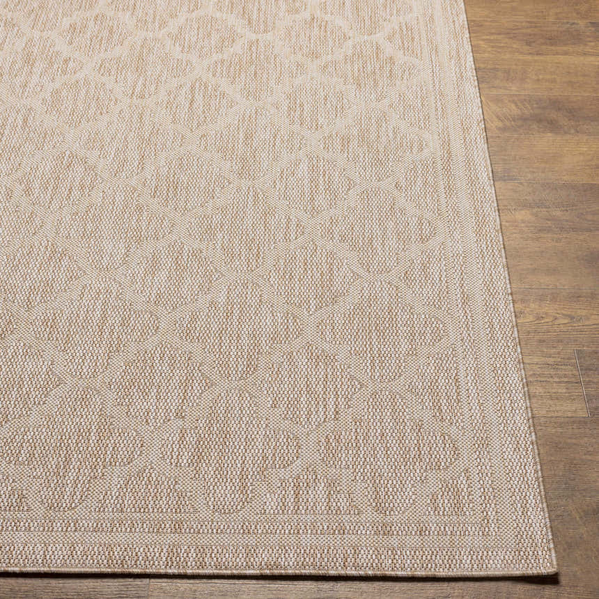 Close-up of the Noam Tan Indoor & Outdoor Rug showing a geometric pattern and woven texture in tan and lambswool. Front