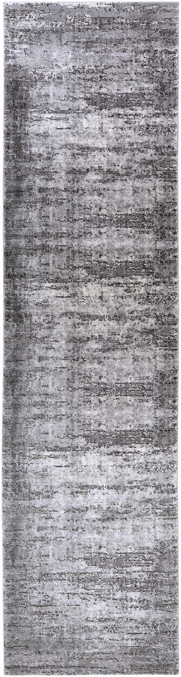Close-up of the Nesmith Updated Traditional Tibetan Rug, showcasing its charcoal and gray abstract pattern and soft texture. Design-Runner-2710