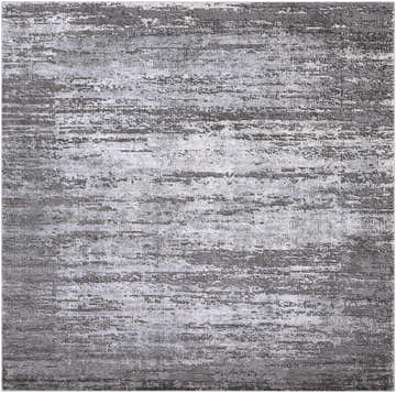 Close up of the Nesmith Updated Traditional Tibetan Rug, featuring a distressed charcoal and gray horizontal pattern. Design-Square-710