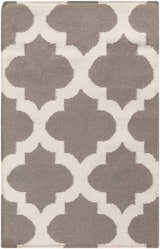 Close-up of the Neshkoro Wool Area Rug. Hand-woven rug with a gray and light beige quatrefoil pattern. Contemporary style. Design-Rectangle-23