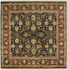 Close-up of the Inglefield Area Carpet. Black rug with traditional floral pattern in brown, mustard, olive, and rust colors. Design-Square-8