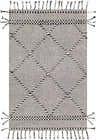 Close-up of the hand woven Ninderry Wool Area Rug. Black and cream rug with diamond pattern and tassels. Bohemian style. Design-Rectangle-576