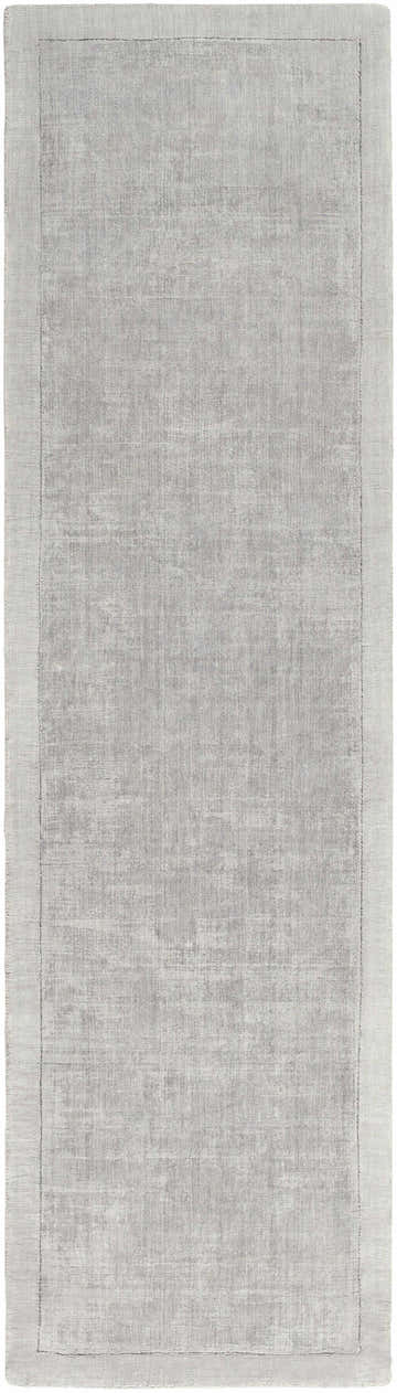 Close-up of the hand-loomed Niota Sheen Light Gray Premium Rug, a contemporary viscose rug with a subtle striped texture. Design-Runner-38