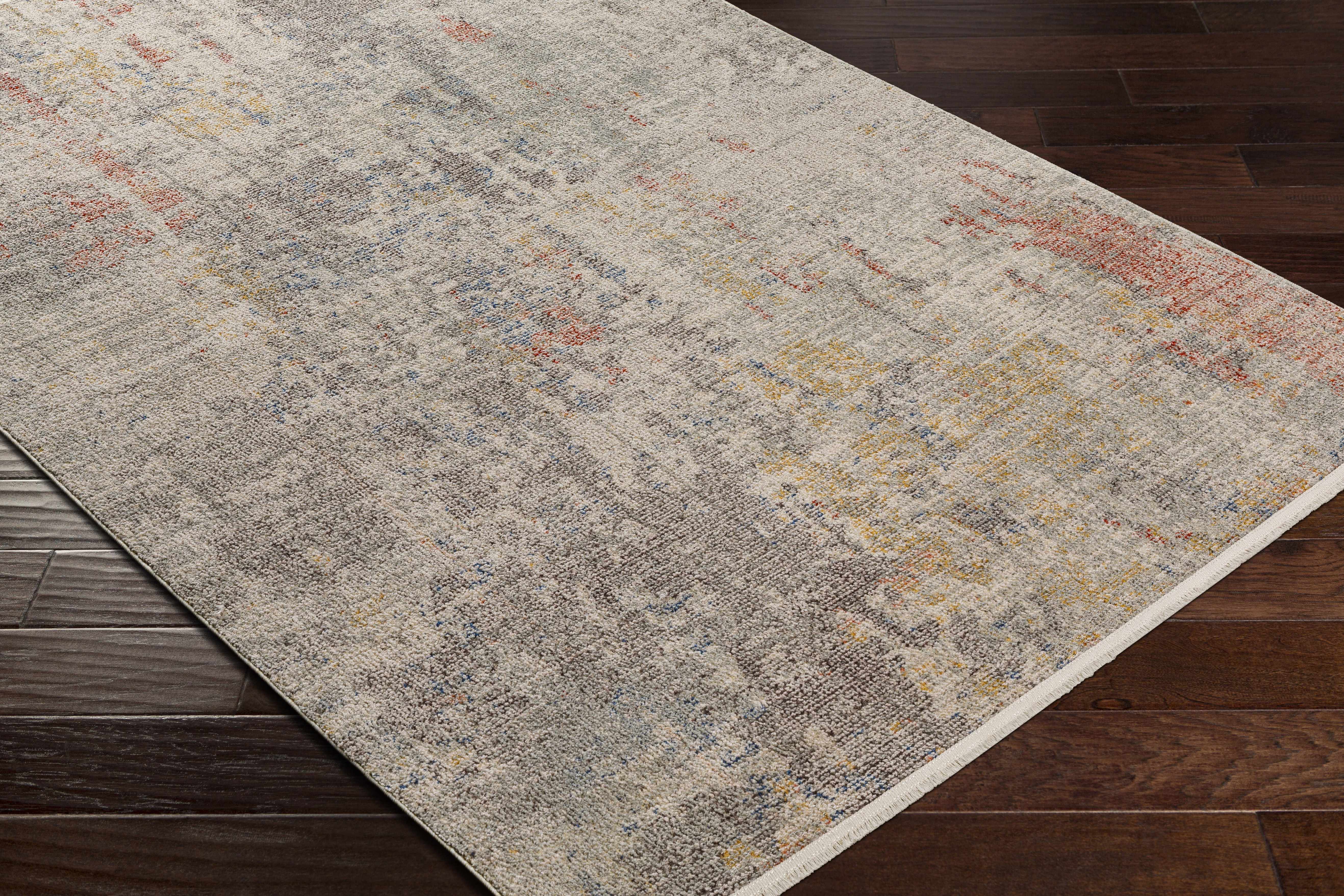Zoomed-in view of the edge of Nile Area Rug - Clearance, focusing on border details and craftsmanship. Contemporary Area Rug Backing  