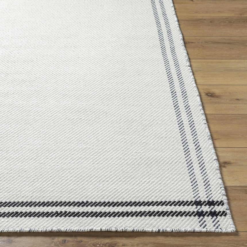 Nimue Cream & Blue Bordered Area Rug - Clearance