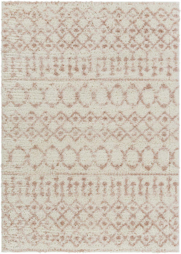 Close-up of the Narrogin Area Rug, a shag rug in cream and blush with a geometric bohemian pattern. Design-Rectangle-5373