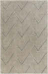 Close-up of the Oceanville Area Rug. Hand-knotted wool rug in charcoal and taupe with a contemporary geometric pattern. Design-Rectangle