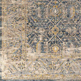 Close-up of the Odala Luxe Performance Rug. Features a traditional design in denim, beige, and mustard tones. Swatch