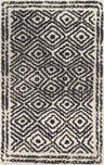 Close-up of the Odenville Area Carpet. Black geometric diamond pattern on light beige 100% wool, hand-knotted texture. Design-Rectangle-58
