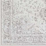 Close up of the Okehampton Area Rug, a farmhouse style rug in charcoal, light gray, and white. Swatch