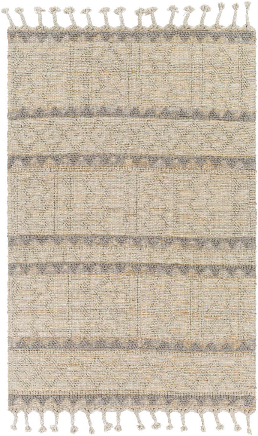 Close-up of the Okurcalar Area Carpet. Hand woven jute and wool rug with gray and tan geometric pattern and tassels. Design-Rectangle-576