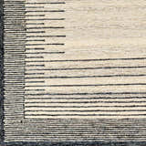 Close-up of the Omeo Wool Area Rug showing bone and dark gray horizontal stripes and hand-tufted texture. Swatch