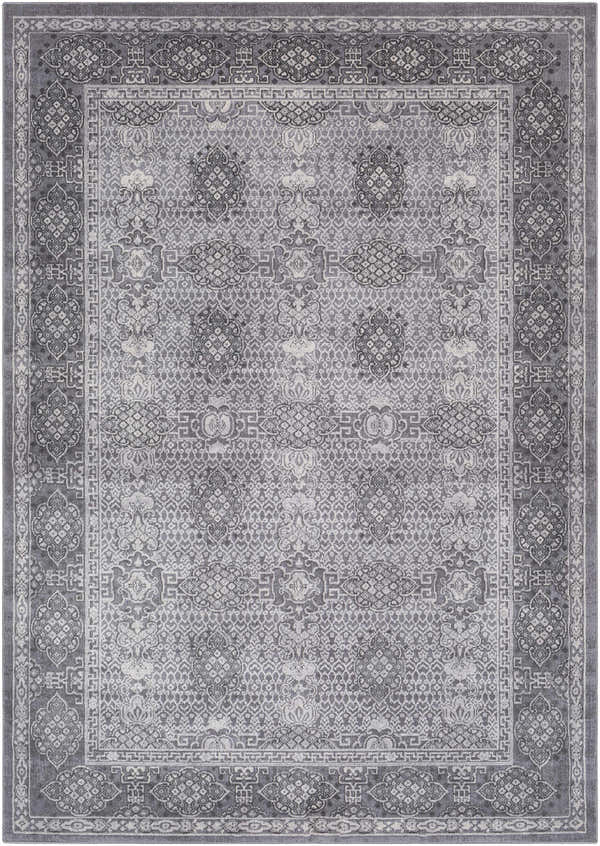 Close-up of the Ordway Area Rug showcasing its traditional gray, charcoal, and ivory bohemian pattern and machine-woven texture. Design-Rectangle-5376