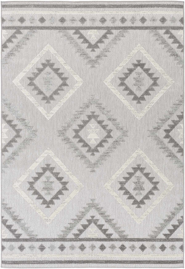 Close-up of the Oreana Area Rug, a machine-woven rug with a geometric diamond pattern in charcoal, cream, and gray. Design-Rectangle-5373
