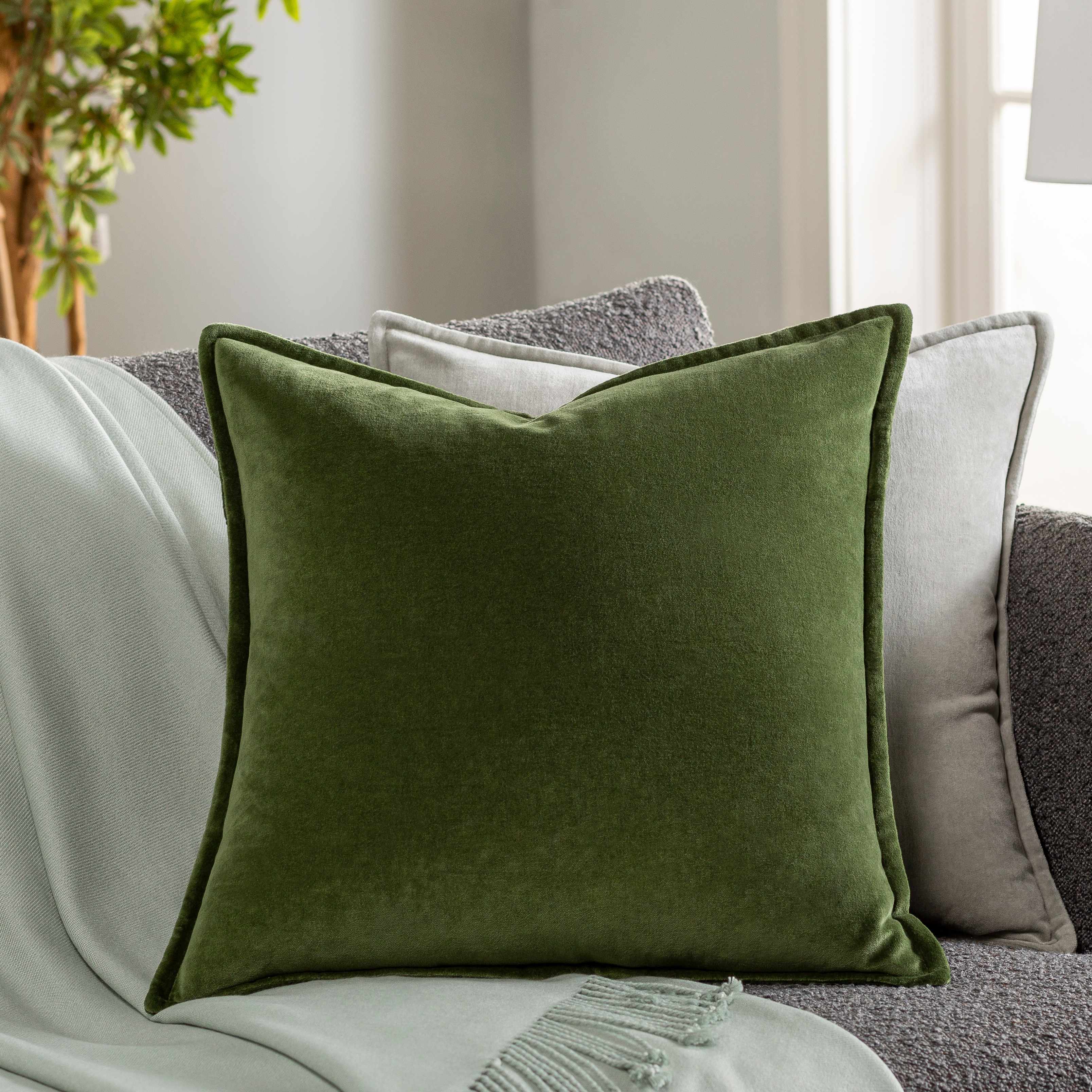 Reverse side of Oshtemo Green Velvet Throw Pillow, focusing on underside structure and material.Contemporary Throw PillowsBacking  